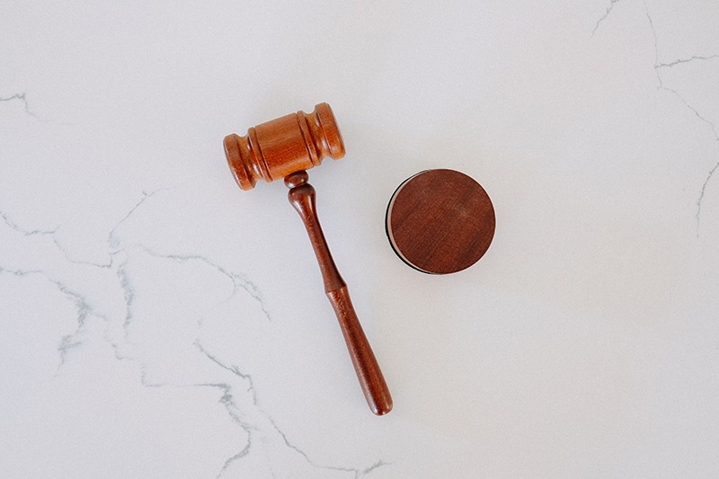 Official gavel deciding legal matters, wills, and trusts in retirement