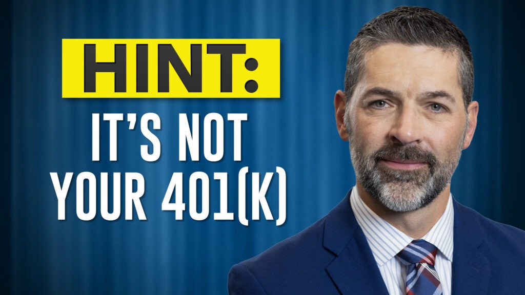 Man standing next to text that says, "Hint: It's Not Your 401(k)