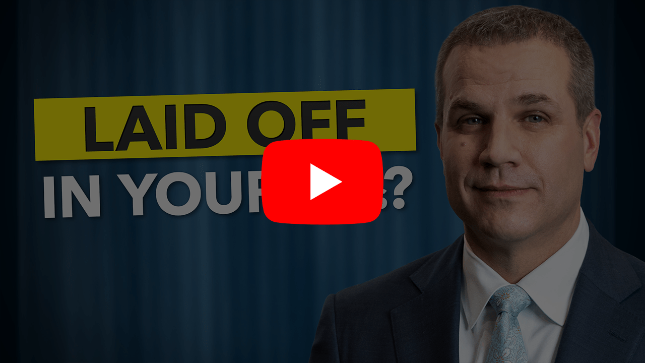 Man standing next to text that says, "Laid off in your 50s?" with YouTube Play button overlaid.