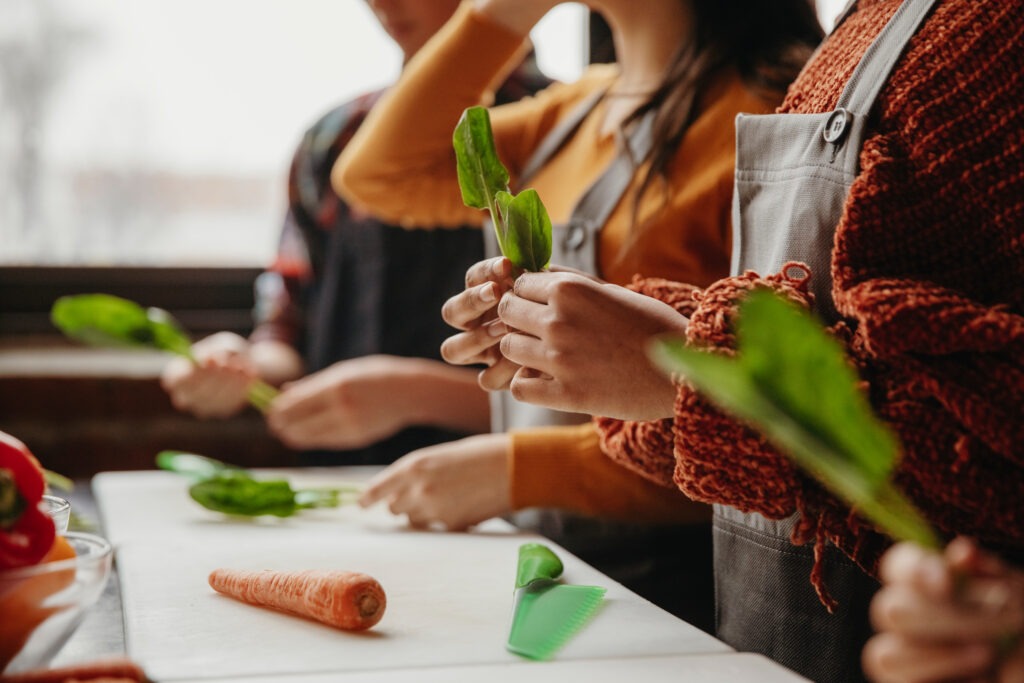 Close up image of a cooking class.