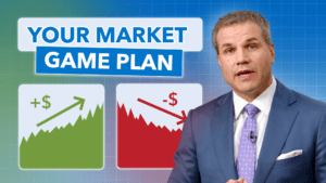 man standing in front of two market charts looking serious.