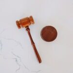 Official gavel deciding legal matters, wills, and trusts in retirement